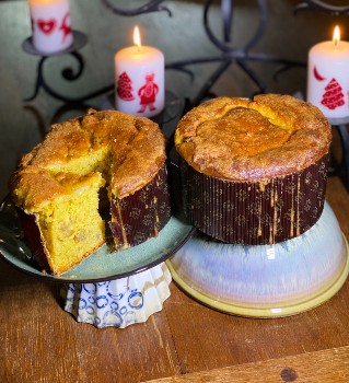 Einkorn Panettone on display with candles | Anna Maria's Foods